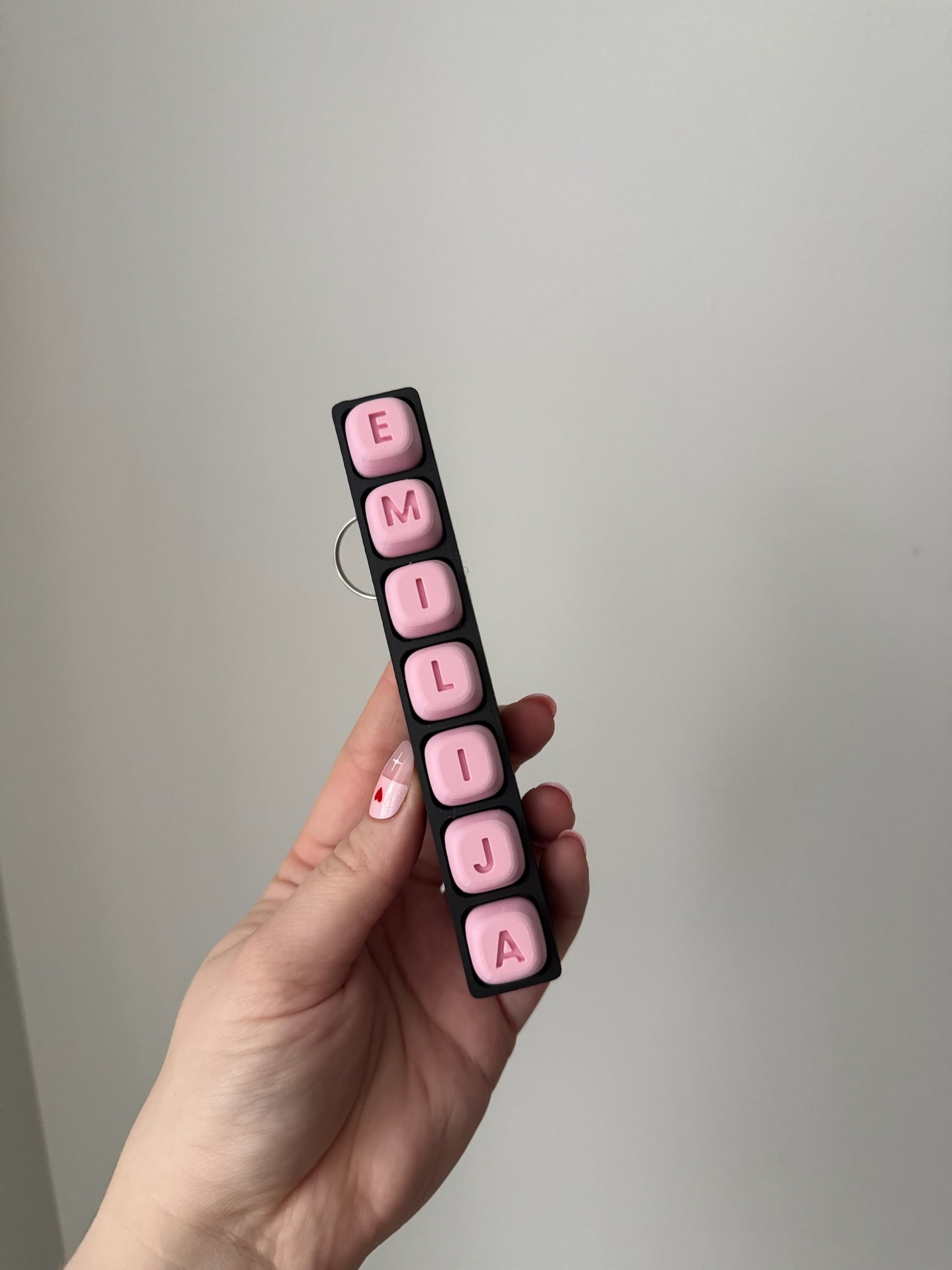 Personalizuotas fidget pakabukas - žaislas