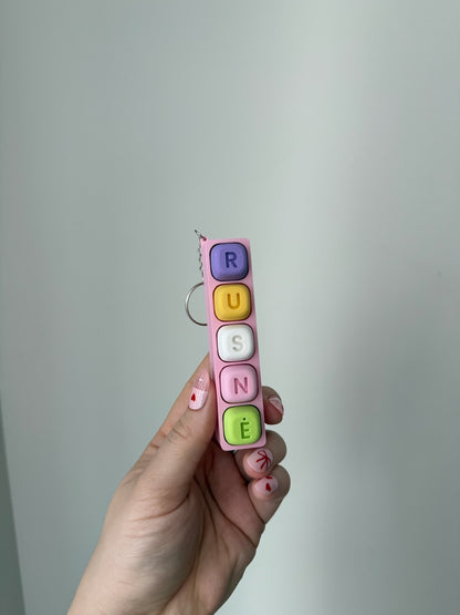 Personalizuotas fidget pakabukas - žaislas